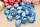 Искусственный цветок(бутон) ткань 35мм, упак 20 шт (160200 голубой)